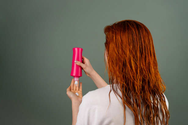 Applying shampoo on hair
