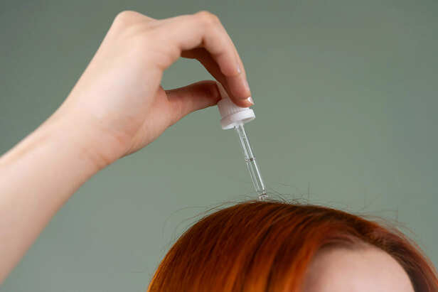 Applying Hair Oil