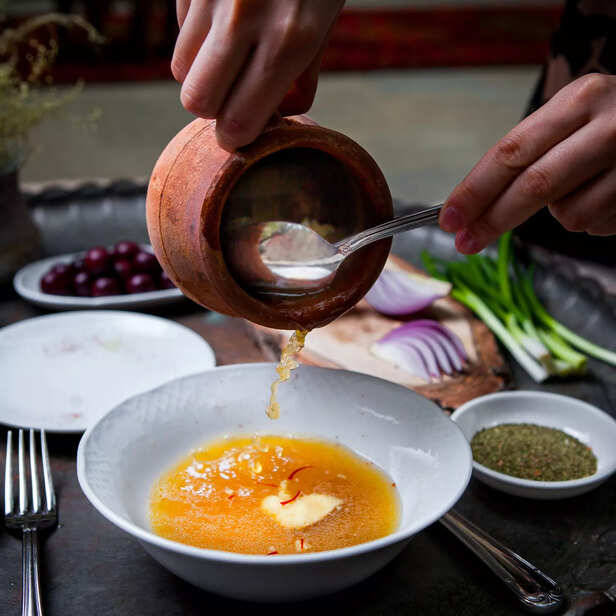 Adding ghee in dishes