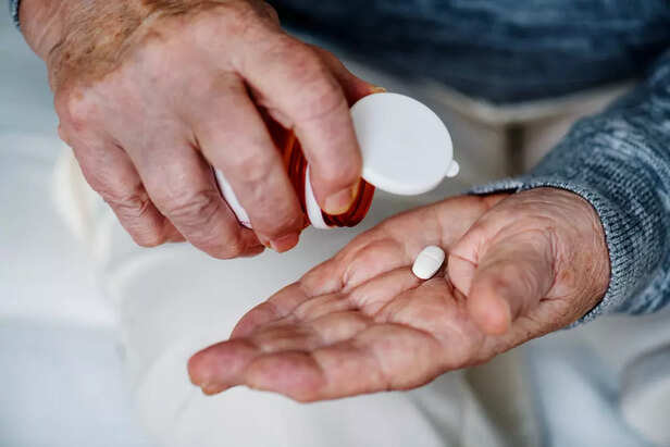 Elderly taking medicine c