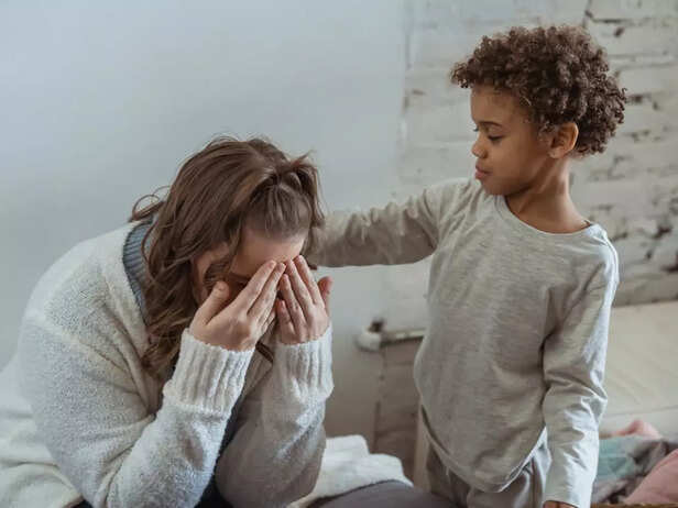 A sad parent and child